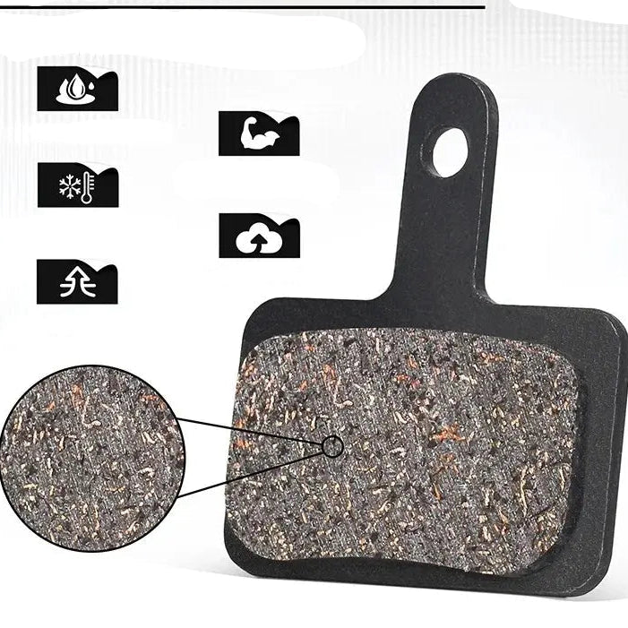 Sintered semi-metallic brake pads