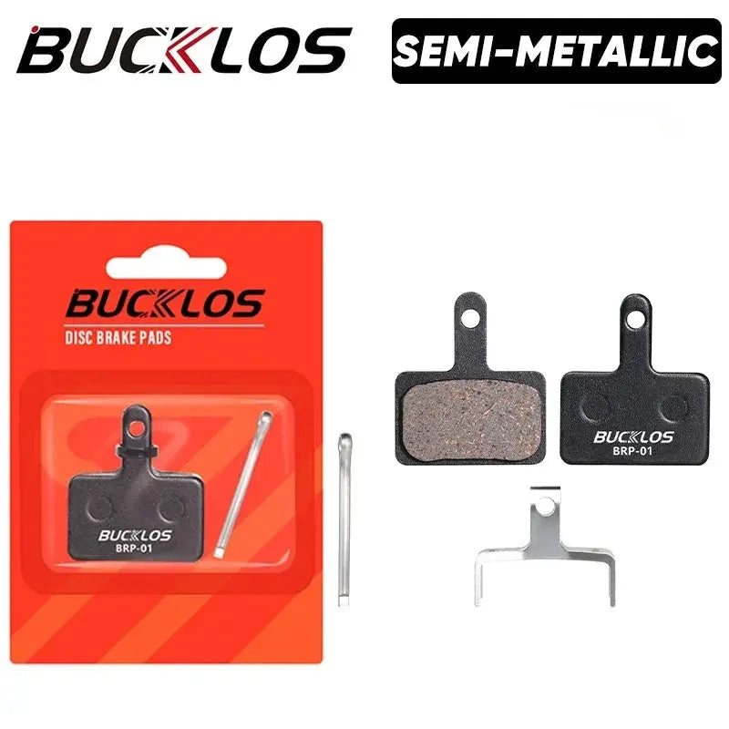 Sintered semi-metallic brake pads