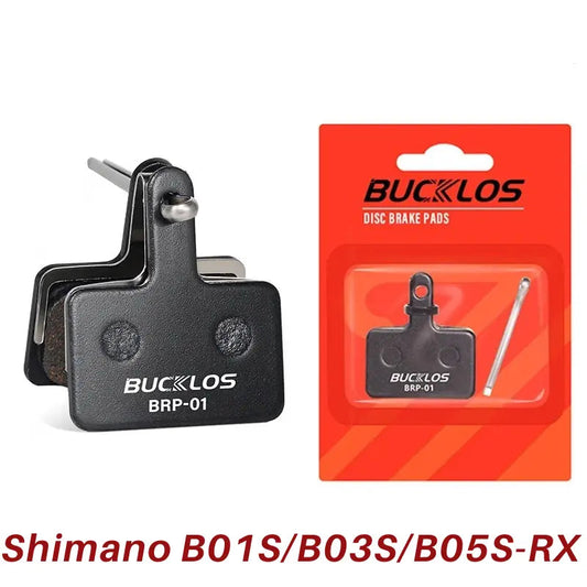 Sintered semi-metallic brake pads